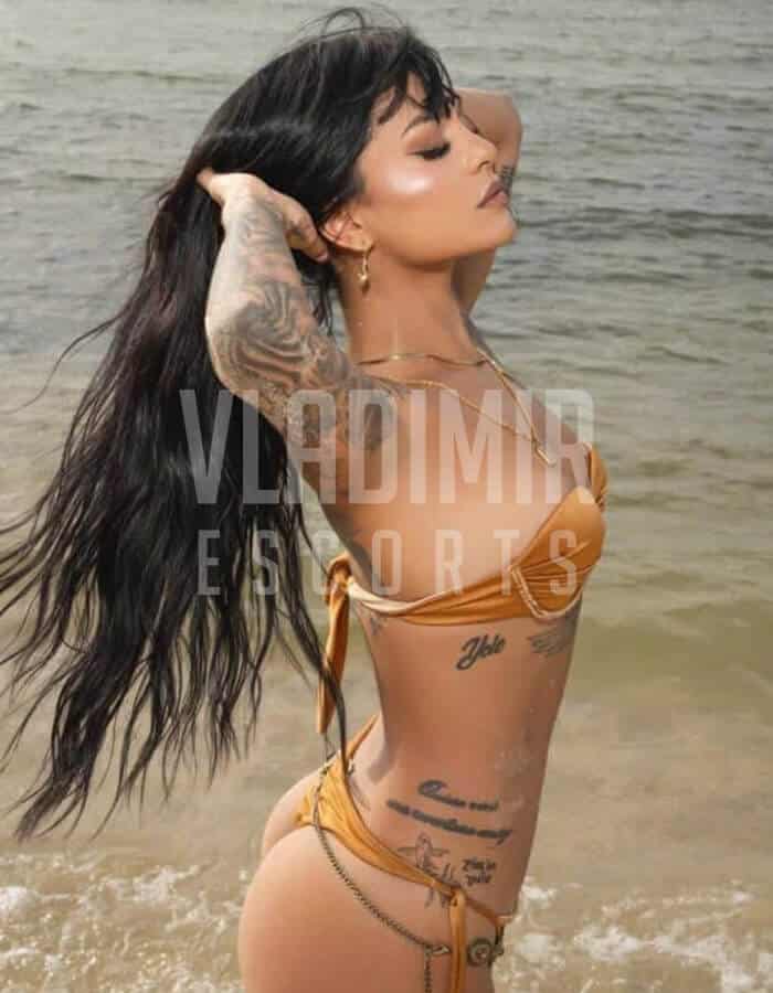 Elegant model showcasing sensual beauty in a sophisticated nature